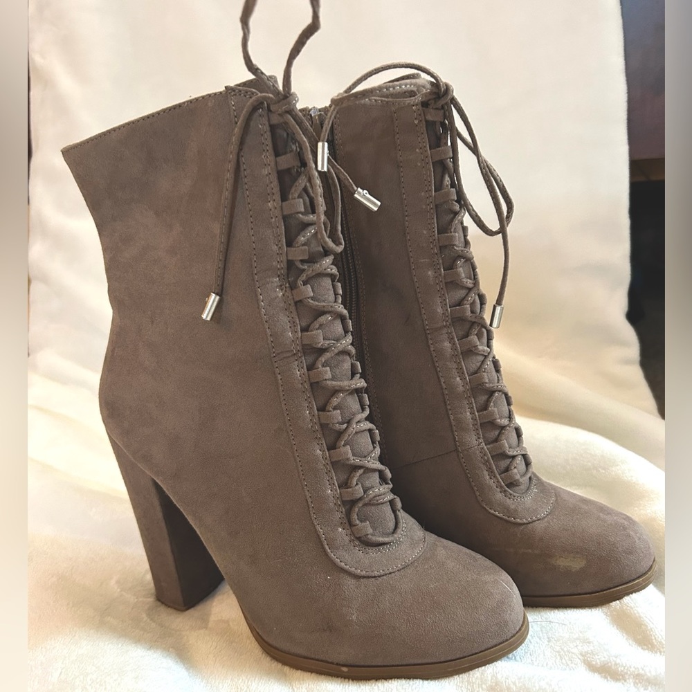 Grey heeled boots. Lace up. Gently worn. Carlos by Carlos Santana size 7.5.